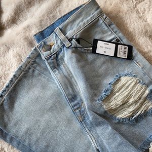 Ripped Jeans by Carmar